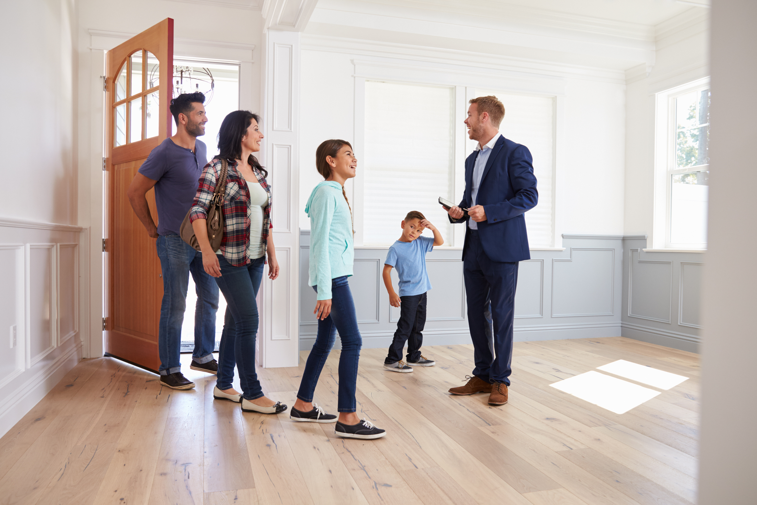 A realtor showing a new home